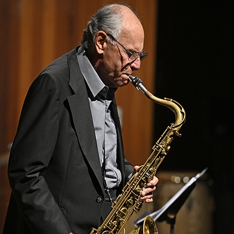 Instructor Bennett Friedman playing saxophone